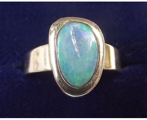 A 14 carat gold ring set opal ring size O