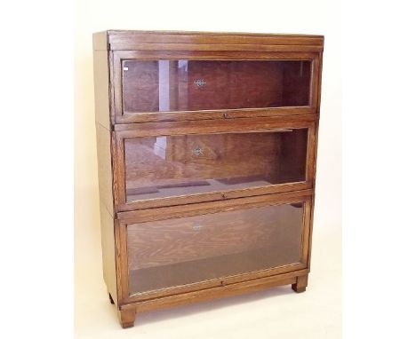 An oak Globe Wernicke three section glazed bookcase