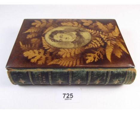 Byrons Poetical Works in leather and mauchline ware cover decorated with ferns and a portrait of Robbie Burns