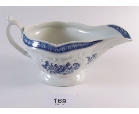 A Worcester first period strap fluted relief moulded sauce boat - c.1765