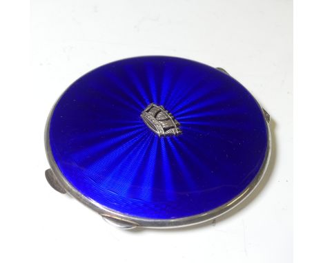 An Elizabeth II silver and enamel Powder Compact, by&nbsp;John William Barrett, hallmarked Birmingham, 1953, the blue guilloc