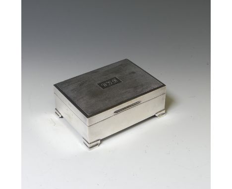 An Elizabeth II silver Cigarette Box, by&nbsp;Francis Howard Ltd., hallmarked Birmingham, 1964, in the Art Deco style, the hi