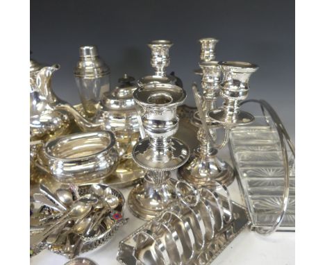 A quantity of Silver Plate, including oval tray, four piece tea and coffee service, a pair of three light candelabra, toast r