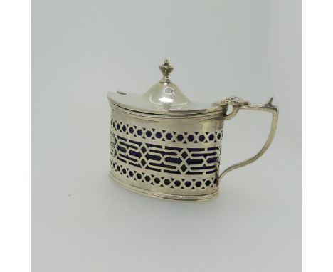 A George V silver Mustard Pot, by&nbsp;Haseler &amp; Bill, hallmarked Chester, 1920, of oval form with pierced geometric deco