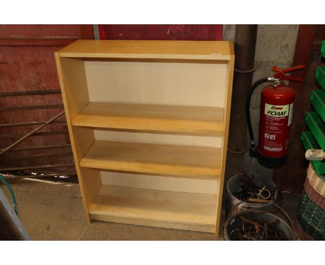 A beech effect shelf unit