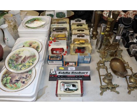 A collection of boxed model vehicles including Matchbox, Burago, Models of Yesteryear etc