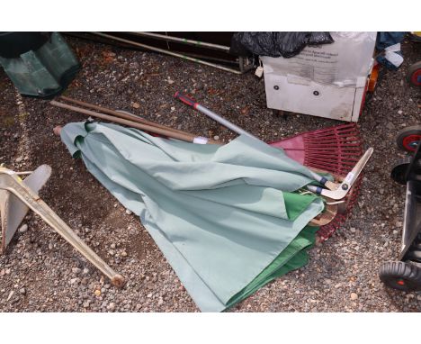 A quantity of gardening tools, garden parasol etc