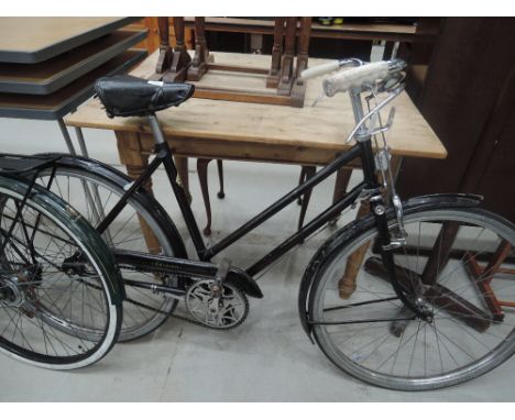 A vintage all steel framed 2030 Raleigh bicycle with Terry seat saddlePOSSIBLY 9050s, in working condition