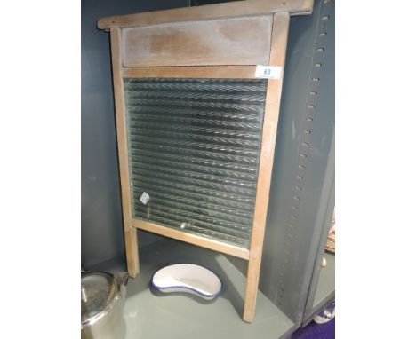 A vintage glass washboard and kidney dish