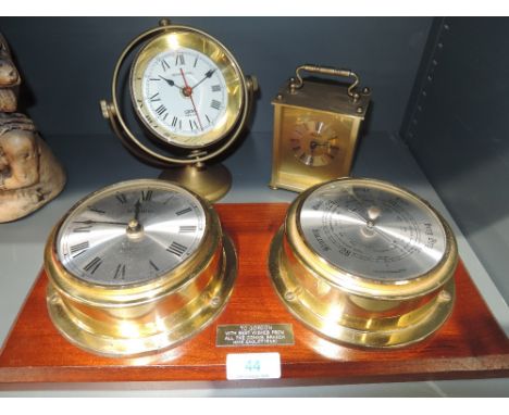 A selection of clocks and barometer including Yachtmaster