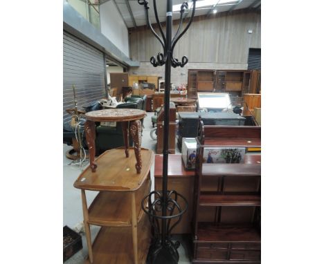 A modern wrought effect coat stand