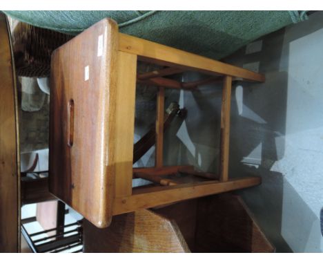 A traditional stained frame stool