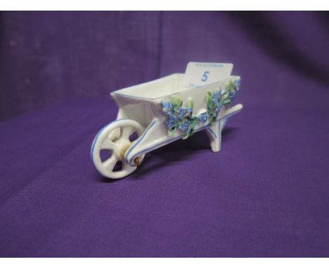 A hard paste ceramic table salt barrow bearing lozenge to base