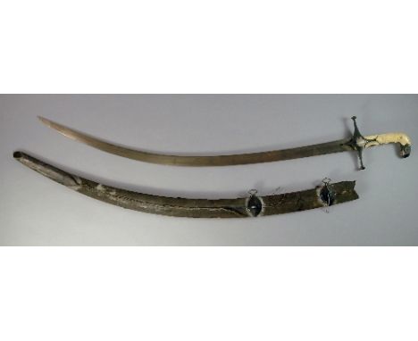 An Indo-persian Mughal silver and ivory mounted talwar shamshir sword, 17th century, the carved ivory and silver mounted hand