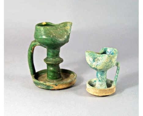 A Kashan turquoise glazed pottery oil lamp on pedestal, 12th/13th Century, oinochoe shaped top over stem and dish base, 8cm h