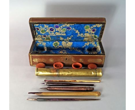 An Ottoman rectangular leather scribe's box, 19th century, embossed and decorated with gilt decoration, the interior lined wi