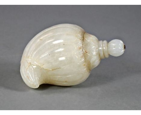 A white jade style conch form scent bottle in the Mughal taste, the screw form stopper and body reeded and carved with leaves