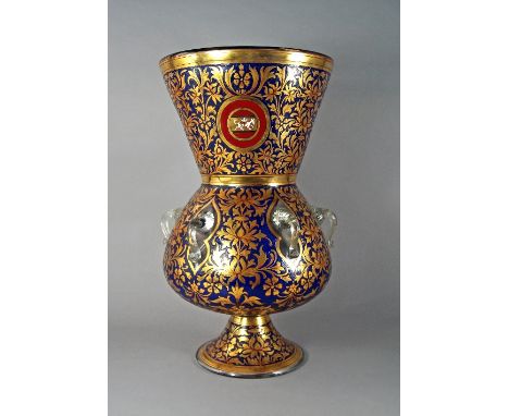 A Mamluk style gilt decorated and enamelled mosque lamp, 20th Century, the flaring neck profusely decorated with gilt and ena