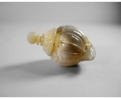 An Indian grey agate shell form bottle, the stopper with spherical reeded finial and reeded body, 9.5cm long CONDITION REPORT