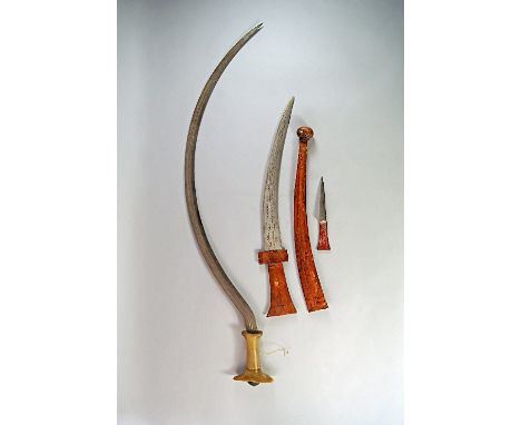 An Indo-Persian horn mounted tulwar, 19th Century, horn handle leading to double fullered blade, 84cm long, with another swor