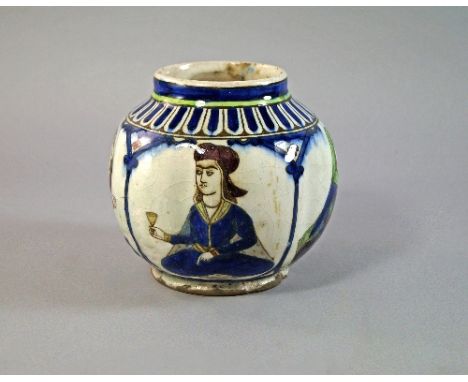 A Persian globular lobed jar, 19th century, painted with panels of figures in architectural alcoves, 15.5cm high