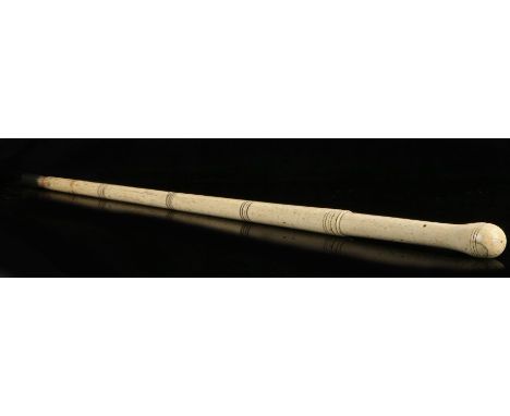 George III whalebone walking stick, circa 1800, the knobbed top above a ring turned tapering shaft, 83cm long