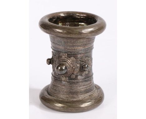 Kachin Burma silver ceremonial bracelet, of waisted form with filigree scroll decoration and three central orbs, 12cm high, 9