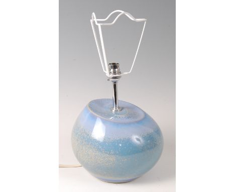 A Cobridge stoneware modernist table lamp, underglaze decorated in tones of blue, with trailing flecked decoration, of squat 