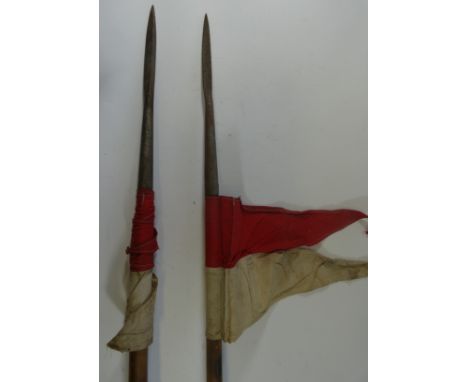 TWO 1868 PATTERN LANCES, each with regulation steel head struck with a series of marks including government ownership broad a