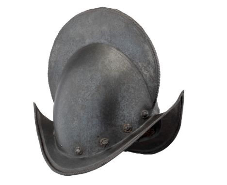 AN ITALIAN COMB-MORION, CIRCA 1580, formed in one piece with a rounded crown rising to a high roped medial comb decorated to 