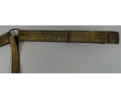 AN EDWARDIAN OFFICER~S SWORD BELT OF THE INDIAN CAVALRY, the blue leather belt faced with gold 1¾ in. |Vandyke| pattern lace,