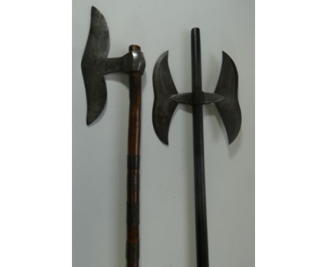 TWO INDIAN AXES, 19TH CENTURY, the first with curved axe-blade, engraved moulded neck, faceted rear face, on its wooden haft 