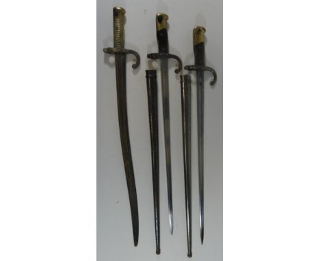 THREE FRENCH BAYONETS, DATED 1871, 1876 AND 1877, the first for the Chassepot rifle, with Châtellerault arsenal inscription a