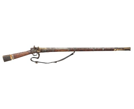 A CAUCASIAN FLINTLOCK RIFLE, LATE 18TH/EARLY 19TH CENTURY, with etched twist octagonal barrel rifled with nine grooves, gold 