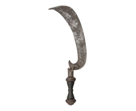 A SOUTH INDIAN HATCHET (ARUVAL), 17TH CENTURY, PROBABLY THAVJAVUR, with curved heavy broad steel blade formed with a sharp in