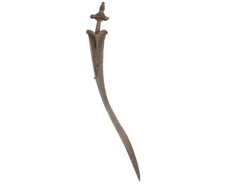 A RARE SOUTH INDIAN MEDIEVAL SWORD, PROBABLY 15TH CENTURY, in patinated condition, with curved single-edged blade formed with