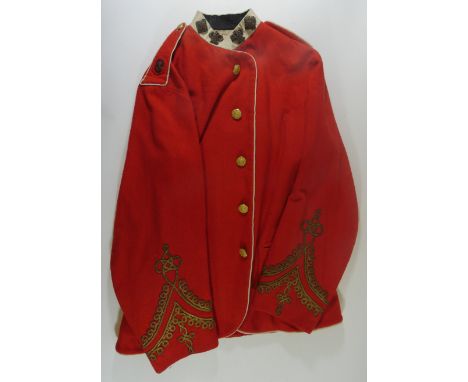 A VICTORIAN INDIAN ARMY OFFICER~S UNDRESS FROCK, the unusual scarlet jacket edged with white piping, with five fine gilt butt