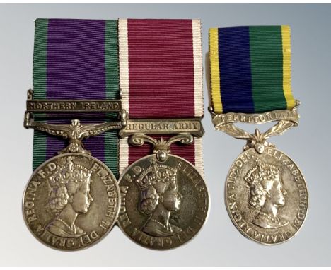 A Campaign Service and Conduct medal trio, Northern Ireland, Regular Army and Territorial Army on ribbons awarded to 23744047