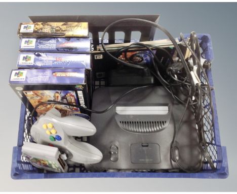 A Nintendo N64 console together with four games, Star Wars, Golden eye etc 