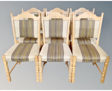 A set of six Continental light oak dining chairs in striped fabric 