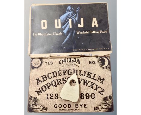 A vintage Ouija board with box by the William Fuld Company of Baltimore 