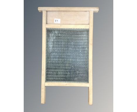 A vintage pine and glass wash board 