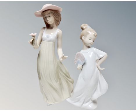 Two Nao figures, girl with flower and girl with fan 