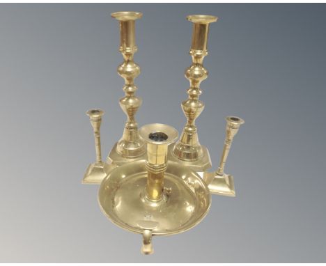 Two pairs of vintage brass candlesticks together with a further brass candlestick 