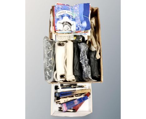 A box of tea towels, fans, lady's hand bags, a box of scales with weights, old cameras etc 