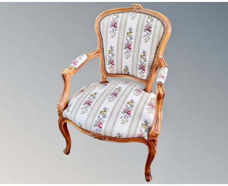 A Continental carved beech tapestry upholstered chair 