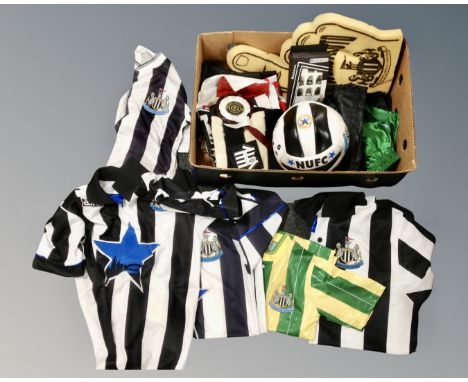 A box of Newcastle United vintage football shirts, 1892 football, scarves, rosettes etc 