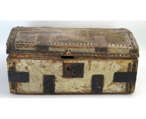 A hide and metal mounted domed travelling trunk, with loop carrying handles to the sides, 56cm wide 