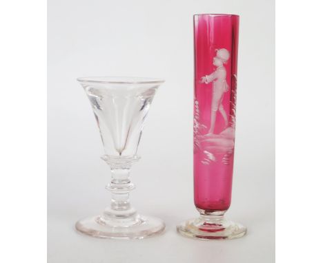 A 19th century toastmaster's glass, of trumpet-shaped outline, on knopped stem and circular foot, 9.5cm high, together with a
