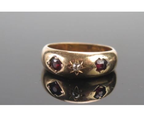 An Antique R18ct Gold, Ruby and Diamond Three Stone Gypsy Ring, size N, Chester 1902, 3.32g 